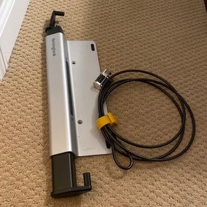 Kensington laptop security lock. Doesn’t come with Allen key to adjust width